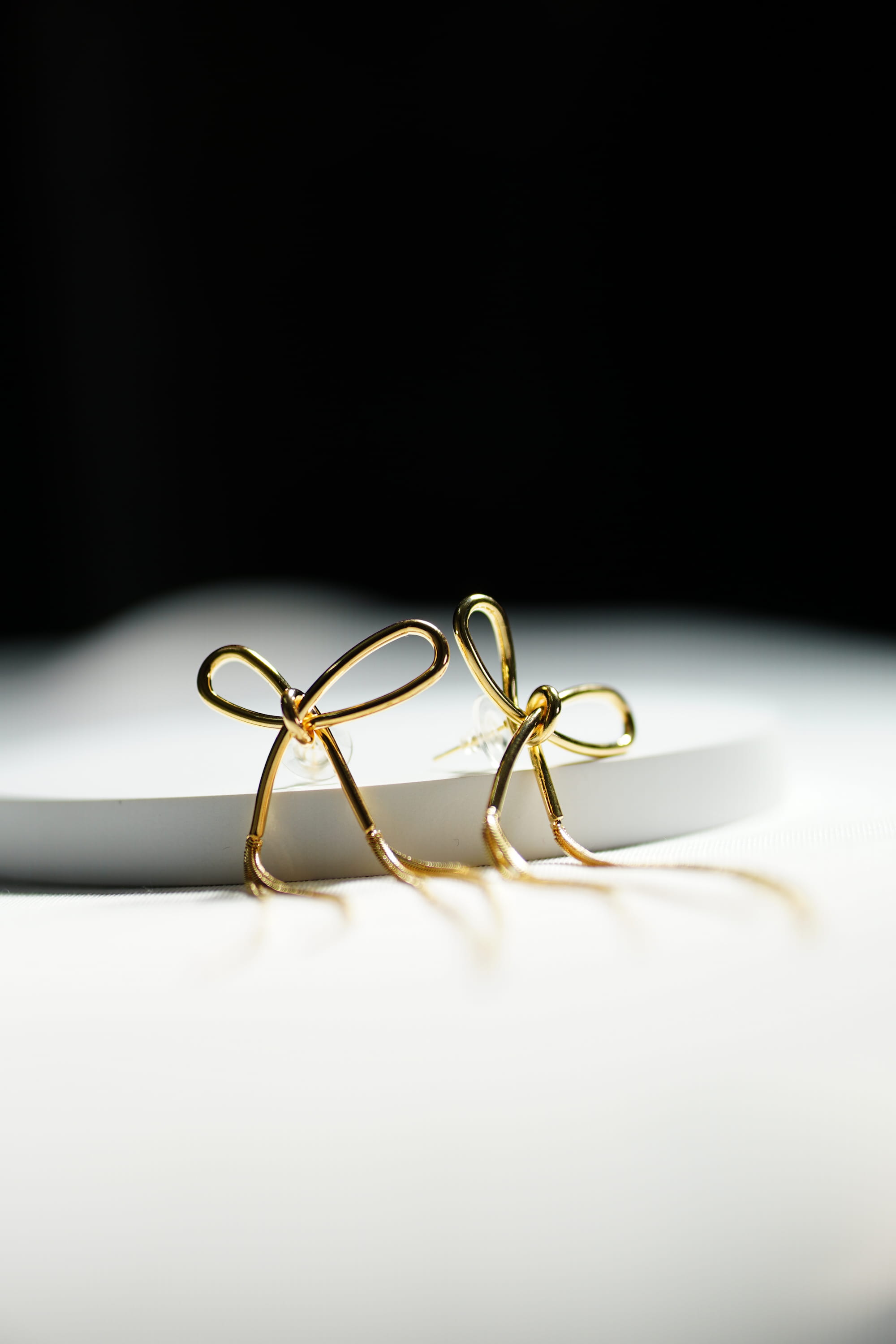 Charmella Bow. Earring.