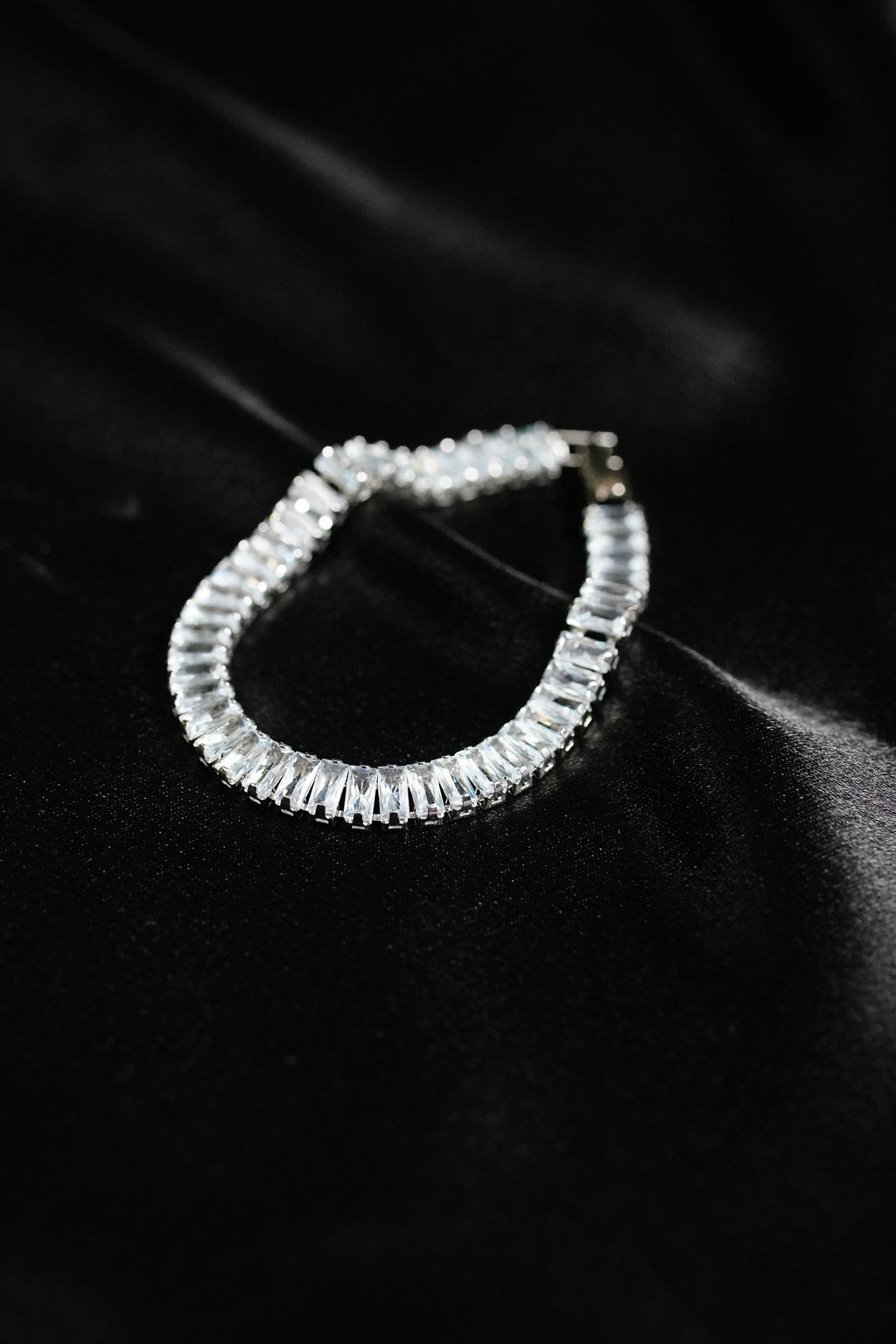 ss diamond cut bracelet on a black background