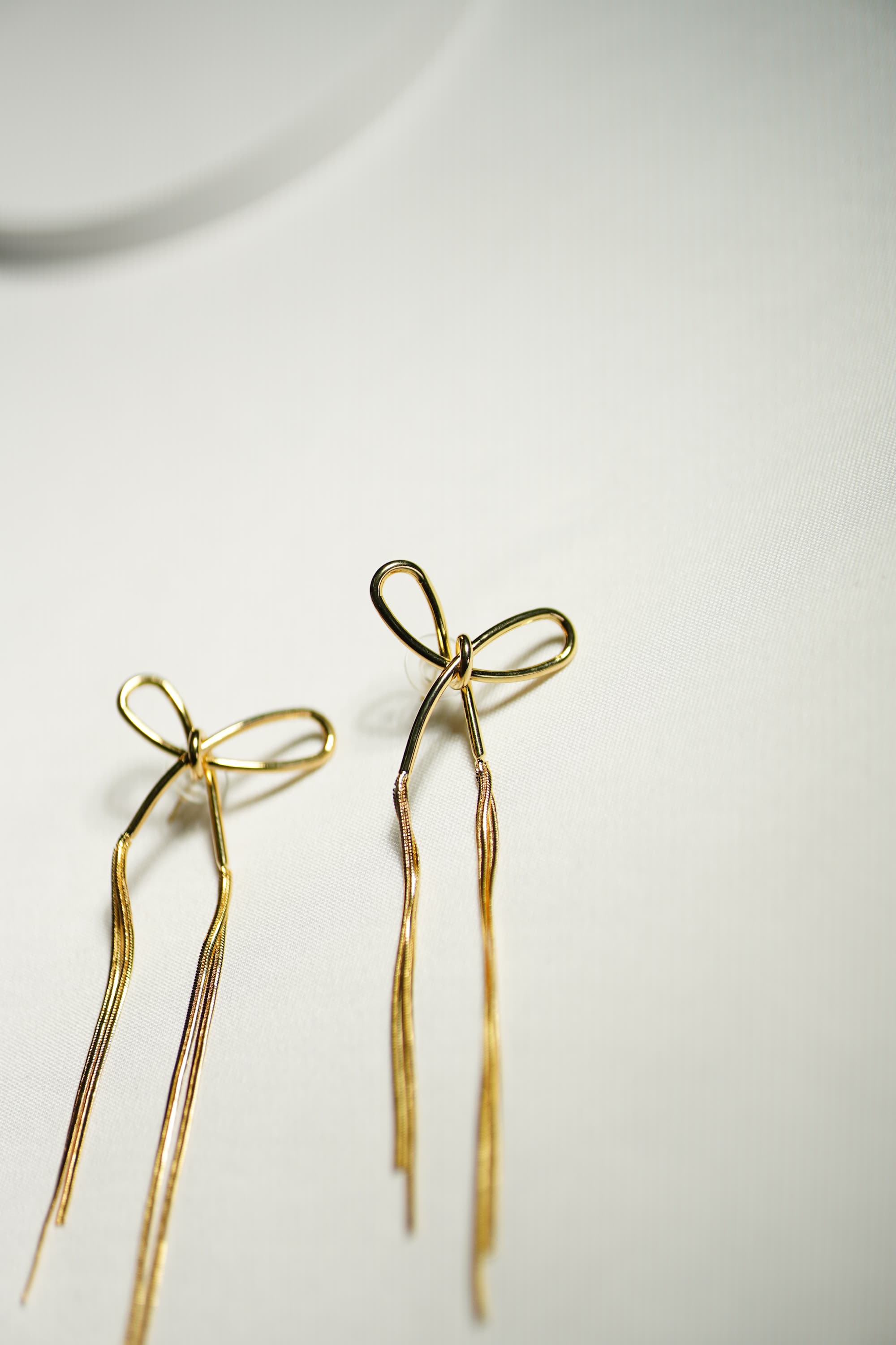 Charmella Bow. Earring.