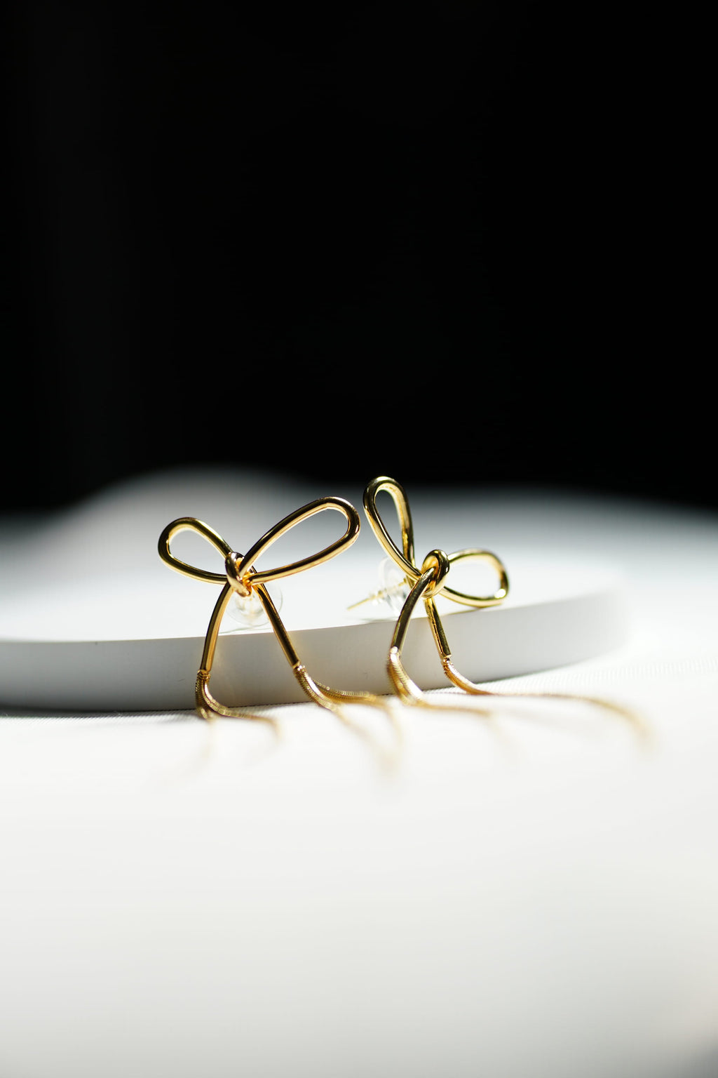 Charmella Bow. Earring.