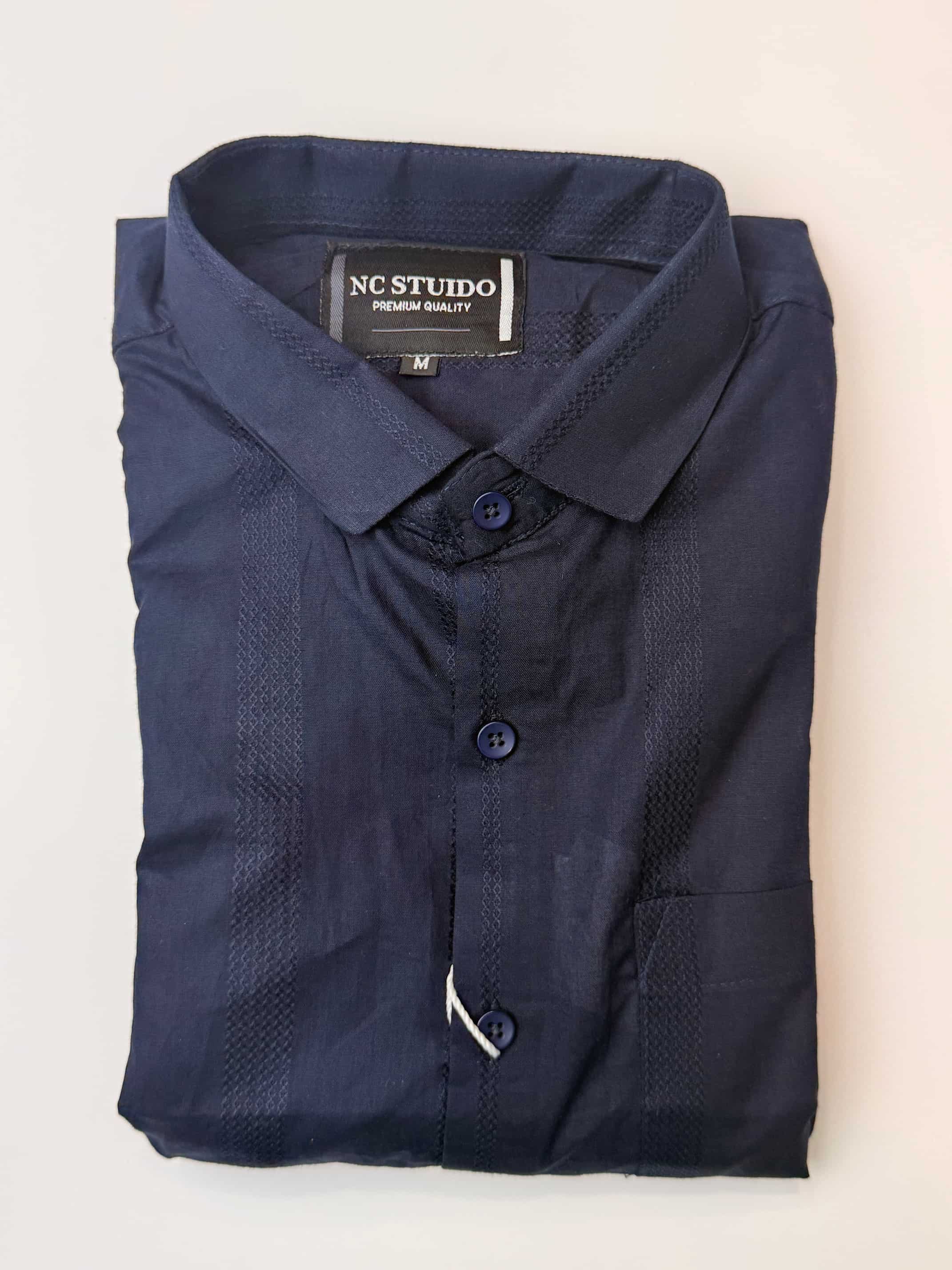 Embroided shirt. minimalist design. dark blue. NC studio.